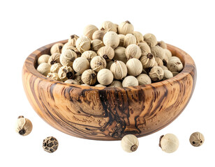 Close-up of white peppercorns filling a wooden bowl, with individual peppercorns around