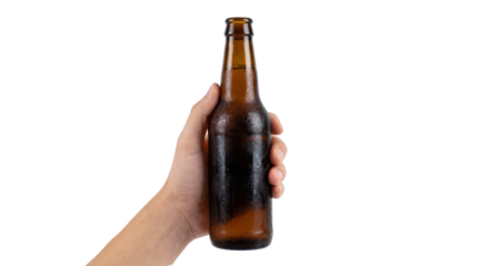 Male hand holding cold brown glass beer bottle vertically with water drops isolated on transparent background