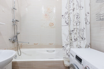 modern bathroom room with toilet and washing machine