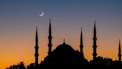 Silhouette of a mosque at dusk with a crescent moon.