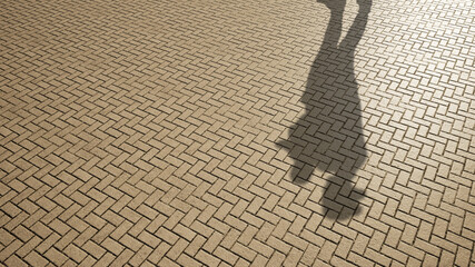 Concept or conceptual background of floor texture surface with a human shadow as silhouette. A 3d illustration metaphor to young childhood education, fun happy family child parent relationship design