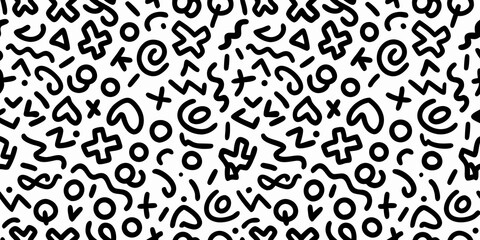 Abstract black and white pattern featuring chaotic scribbled symbols and shapes