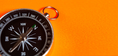 close up of orange compass © Artvibe