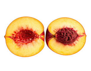 Sliced peach halves revealing flesh and pit on black background