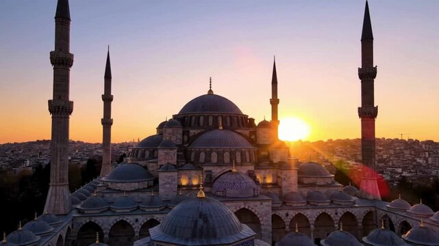 Beautiful cinematic aerial view of the Blue Mosque, Hagia Sophia in Istanbul, Turkey, during sunset