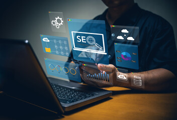 A person interacts with digital data and SEO tools on a laptop, showcasing the intersection of technology and online marketing.