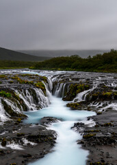 Obraz premium long exposure view of the scenic Bruarfoss waterfall on the Golden Circle tourist route in Iceland