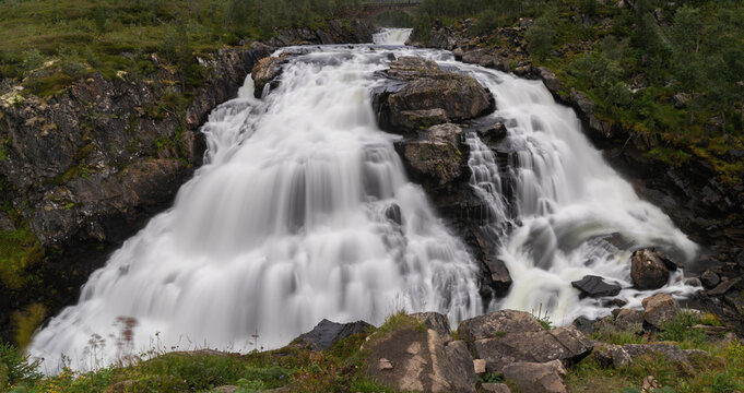 view of the broad upper Voringsfossen Waterfall near Fossli in central Norway