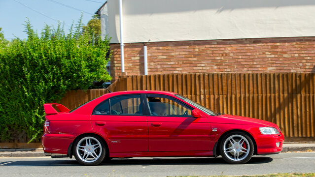 Bletchley,Bucks,UK - Aug 25th 2025: 2002 red Honda Accord classic Japanese  car driving on a British road