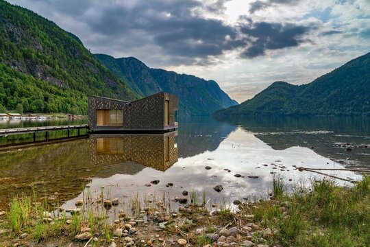 view of the idyllic Soria Moria Sauna building on Lake Bandak in Dalen