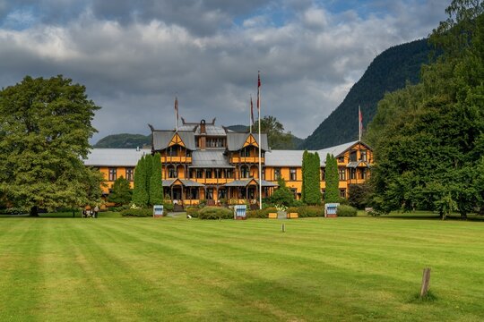 view of the historic wooden Dalen Hotel on Lake Bandak in Telemark County