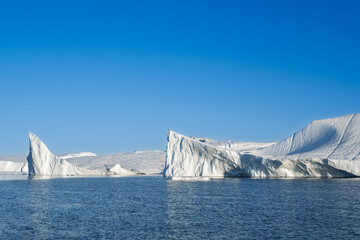 Gigantic Ice Formations Emerging from Ilulissat Icefjord, Greenland © Michel