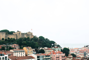 Colorful hillside view over historic Lisbon rooftops