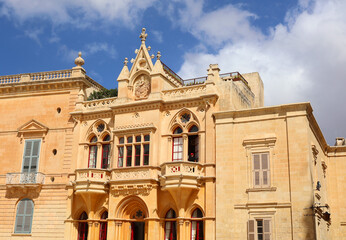 Old palace in Saint Paul's Square in Mdina in the center of the island of Malta: View of the Casa Gourgion neo-Gothic palace