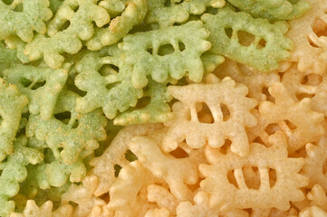 Crab chips in the form of crabs, for backgrounds or textures