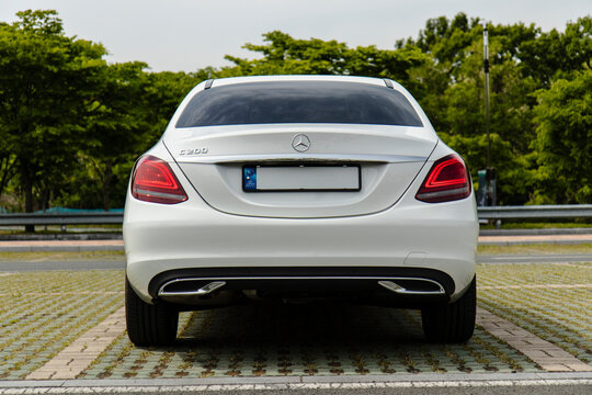 May 6, 2021, Seoul, South Korea - Rear view of a white Mercedes-Benz C200 sedan parked outdoors