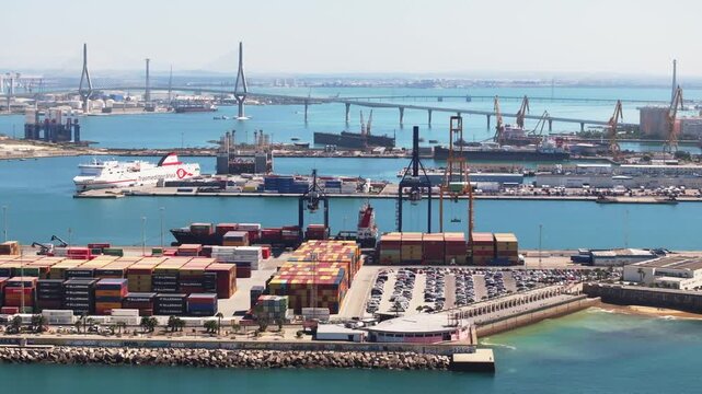 Aerial drone wide view of The Port of Cadiz Bay in C&aacute;diz, Andalusia, Spain, Europe, on bright sunny day. Commercial grading