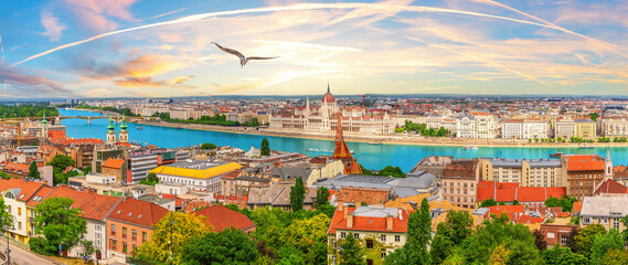 Budapest skyline panorama of Hungarian Parliament and Calvinist church on the Danube