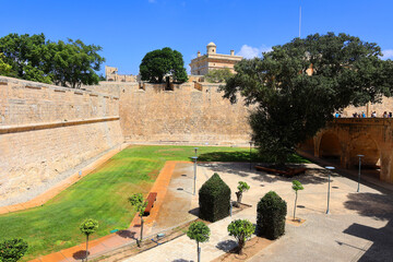 The fortifications of Mdina are a series of defensive walls which surround Mdina, the former capital city of Malta from antiquity to the medieval period