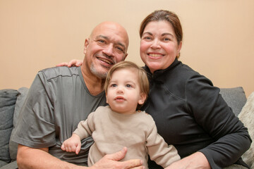 Portrait of authentic Latin American family with a boy child, Toronto, Canada