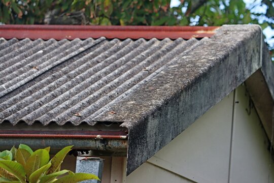 Old asbestos corrugated roof on a fibro garage