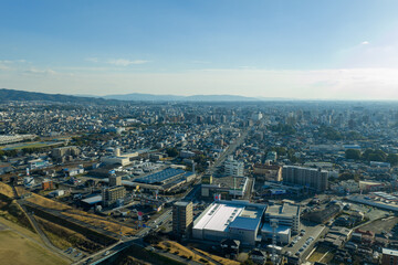 Aerial view of residential area and cityscape in Kurume, Fukuoka, Japan.
