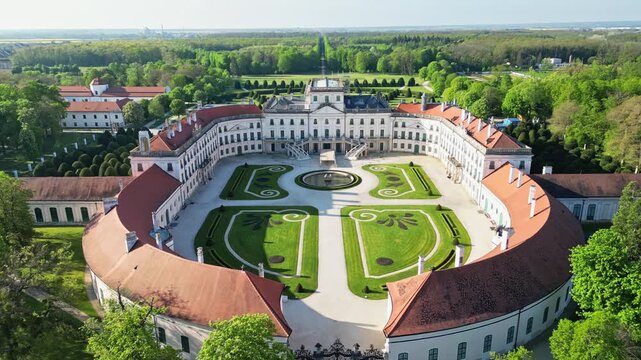 Aerial view of Esterhazy Castle revealing its grand architecture, manicured gardens, and the surrounding lush greenery, Fertod, Sopron, Hungary.