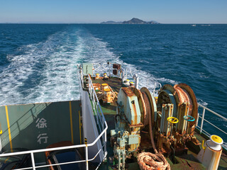 Ferry Wake on Japan National Route 42 with “Slow Speed” Navigation Sign