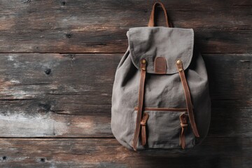 Gray canvas backpack on rustic wooden planks (1)