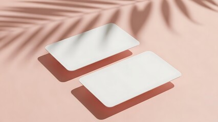 Abstract white cards with palm leaf shadows on pink surface