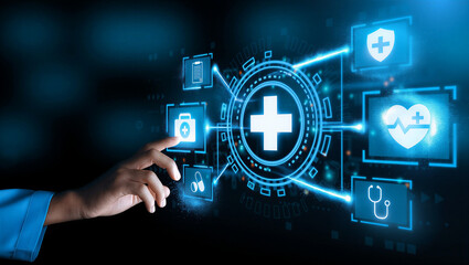 Blue medical icons on screen with hand touching digital healthcare symbols on futuristic interface