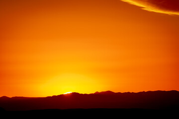 Sun Disappears Into The Mountains Of Mexico In Big Bend