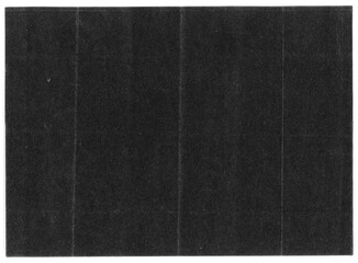 Black paper texture with visible fold lines on a neutral background, creating a minimalist and modern surface ideal for photo overlays and graphic design.