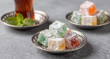 Turkish Delight Candy on Plates with Tea Sweet Treat