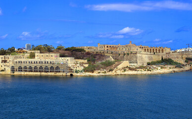 The fortifications of Valletta are a series of defensive walls and other fortifications which surround Valletta, the capital city of Malta