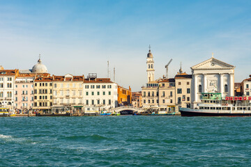 Fototapeta premium Leaning San Giorgio tower and Venice embankment, Italy