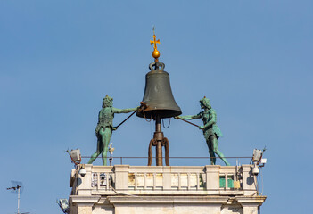 Fototapeta premium Bell on top of Astronomical clock tower in St. Mark's square, Venice, Italy