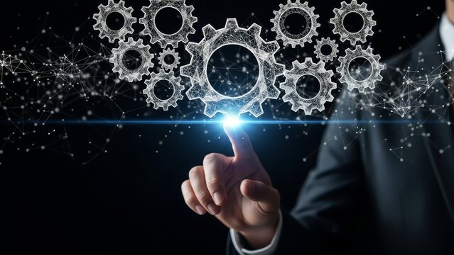 Businessman's finger touches a glowing digital gear system representing innovation, process automation, and technological advancement in a modern enterprise. - Powered by Adobe