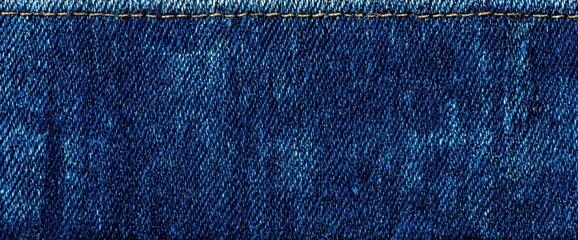 ブルーカラーのステッチディテールが施されたデニム生地