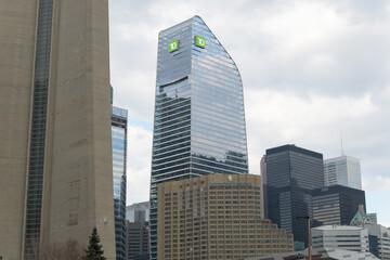 Naklejka premium mix of contemporary architectural styles (CN Tower base, TD Terrace, Intercontinental hotel, and office buildings) viewed from Bremner Blvd, Toronto
