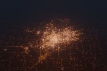 Obraz premium Aerial shot of Springfield (Illinois, USA) at night, view from north. Imitation of satellite view on modern city with street lights and glow effect. 3d render