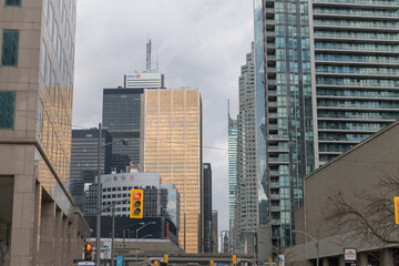 Naklejka premium looking north on Bay St from Harbour St to buildings in the financial district, condo towers, Toronto