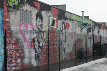 Naklejka premium street art at the rear of Platinum Auto Collision, an auto body and collision repair shop located at 2 Cariboo Av in Toronto (shown from Junction Triangle / West Toronto rail area)