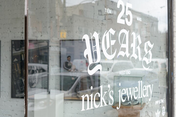 Naklejka premium Cry Baby Gallery (1468 Dundas St W, Toronto) with Nick’s Jewellery 25 Year Anniversary celebration sign