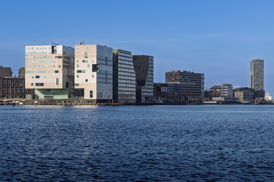 View of the modern architecture of the Palace of Justice (Paleis van Justitie) on the IJdok peninsula under a blue sky. Amsterdam Netherlands, 28 december 2025