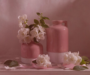 Still life with vases and jasmine in white, pink and green tones