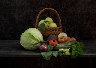 On the table are washed, clean vegetables and fruits, ready to eat and prepare healthy food.
