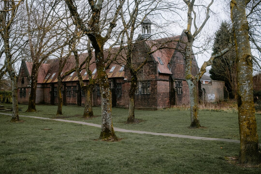 Church yard at St Augustines Gothic-style red brick church Swinton Manchester.
