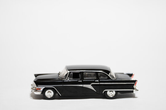 Bucharest Romania 10 January 2026.GAZ-13 Chaika classic Soviet luxury car scale model isolated on white background. Detailed miniature replica featuring elegant vintage design, chrome accents, and ico