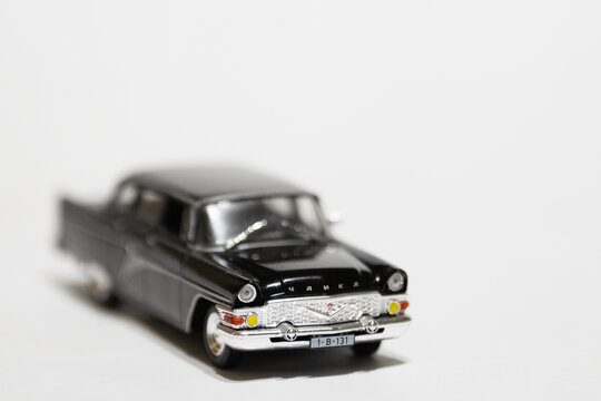 Bucharest Romania 10 January 2026.GAZ-13 Chaika classic Soviet luxury car scale model isolated on white background. Detailed miniature replica featuring elegant vintage design, chrome accents, and ico